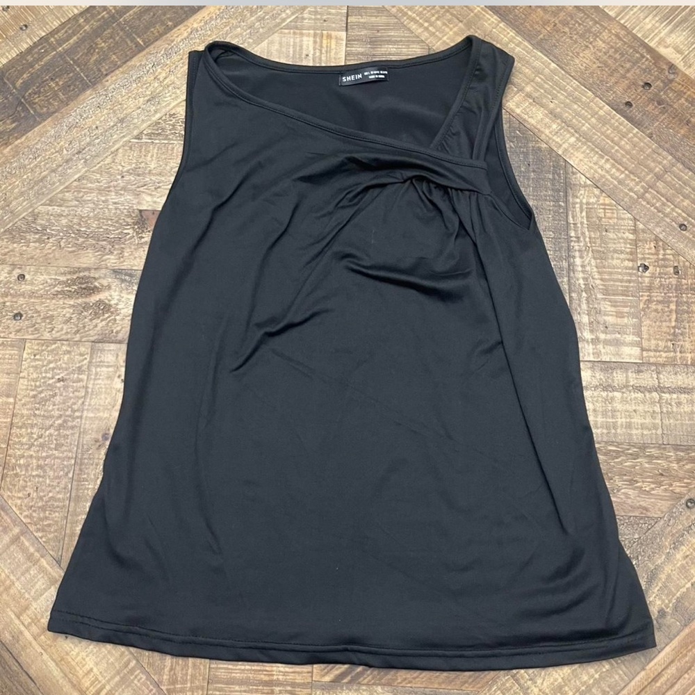 Shein black sleeveless top featuring a distinctive twist-front at neckline